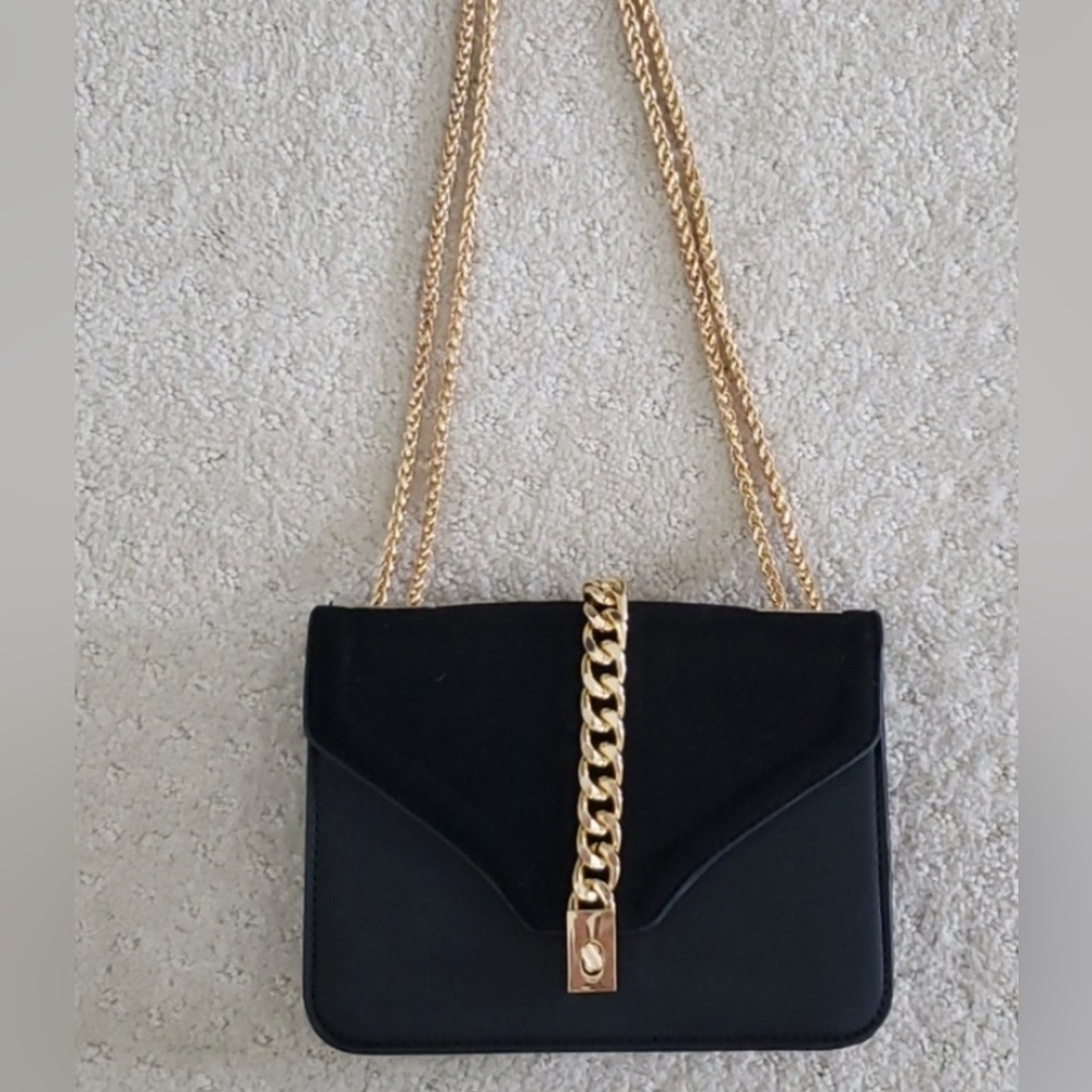 Stunning hardware EUC crossbody with adjustable strap